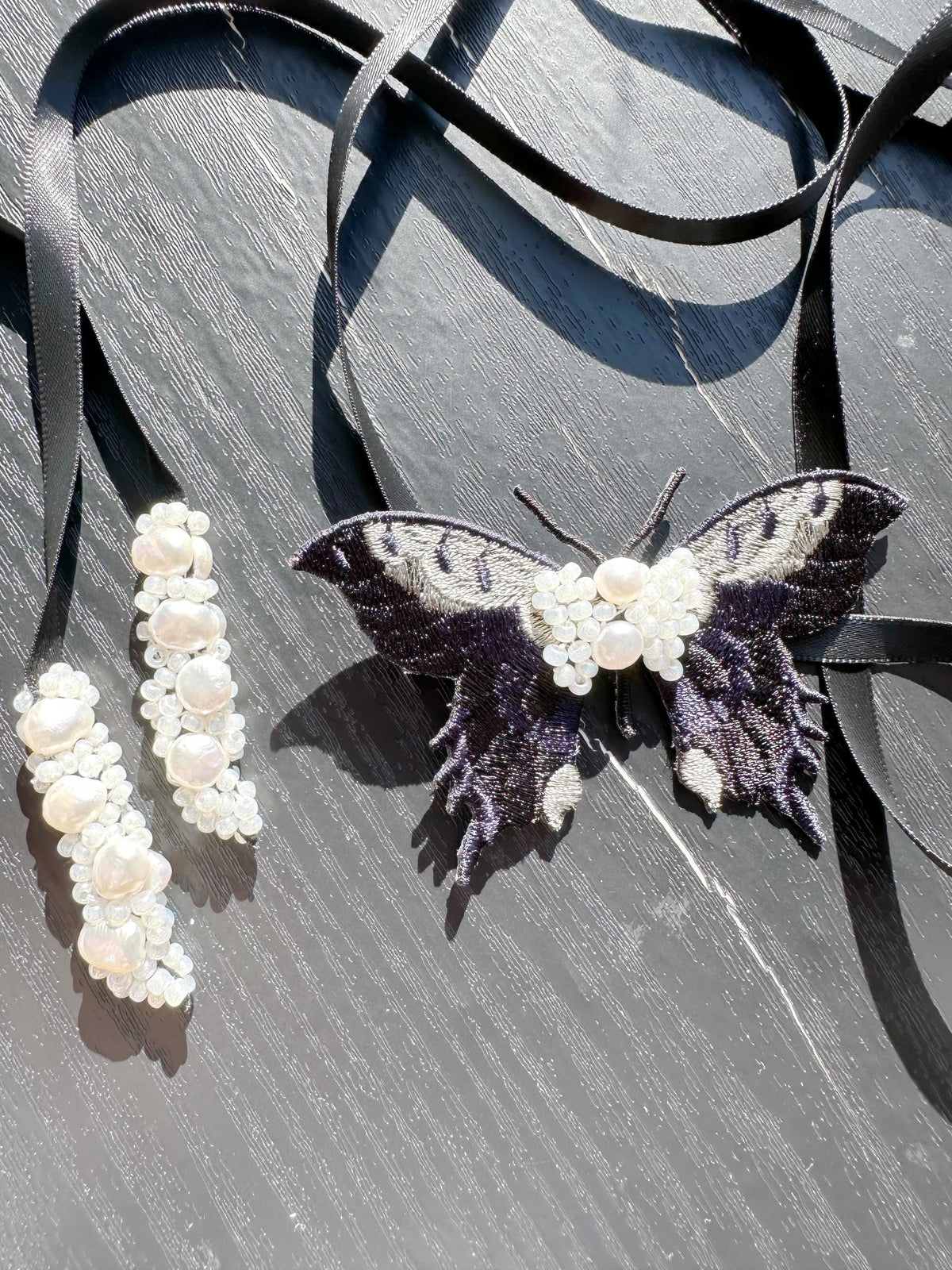 Handmade Choker featuring delicate hand-stitched embroidery of black color butterfly, adorned with freshwater pearls and glass seed beads