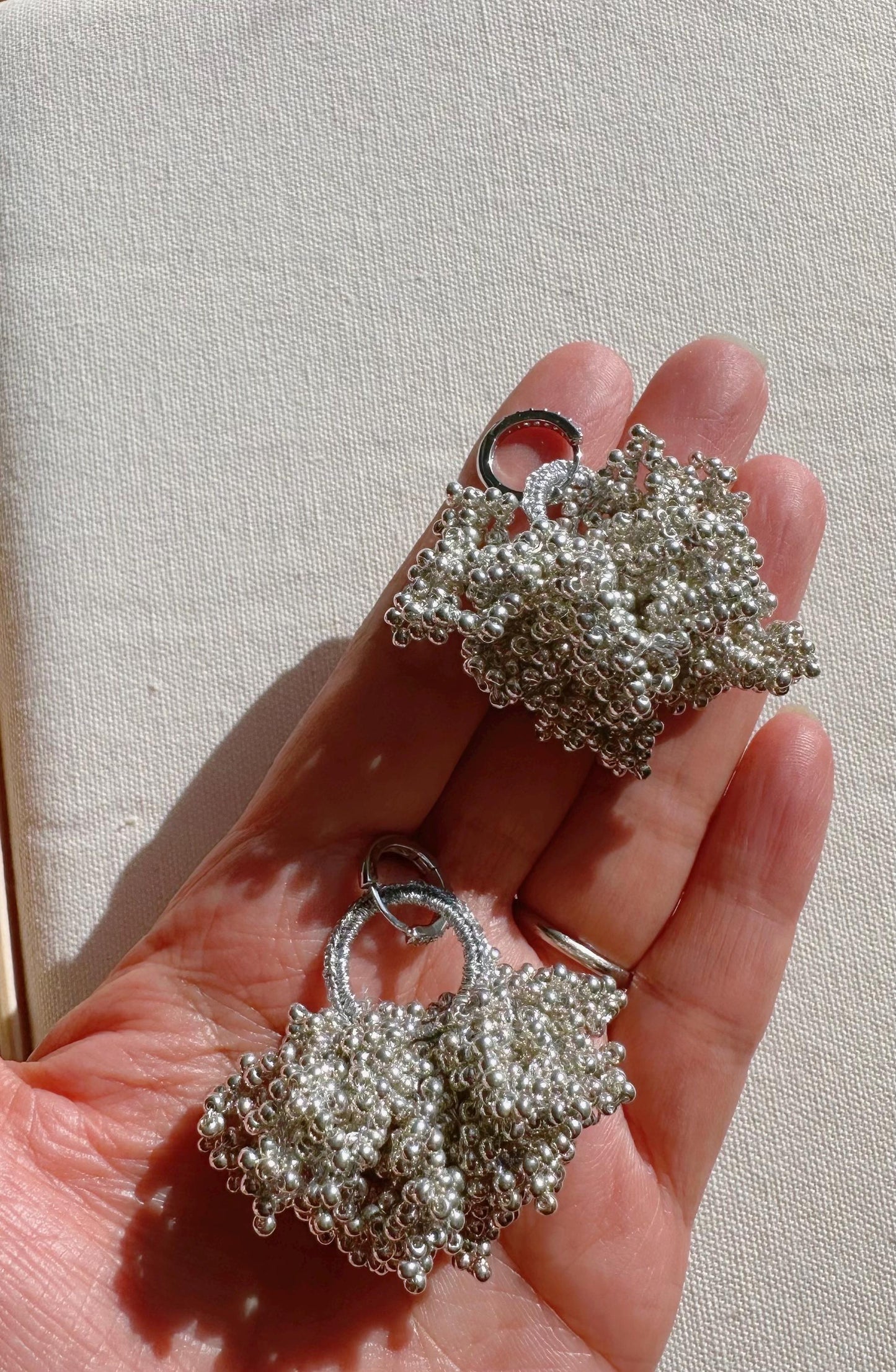 Crochet with Metallic Embroidery Thread and Gary color glass beads , with 925 sterling silver Earrings hoops 2” lengths