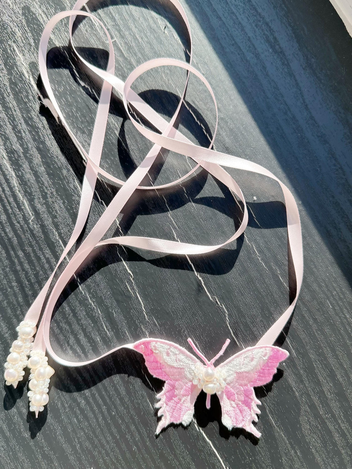 Handmade Choker featuring delicate hand-stitched embroidery of pink color butterfly, adorned with freshwater pearls and glass seed beads