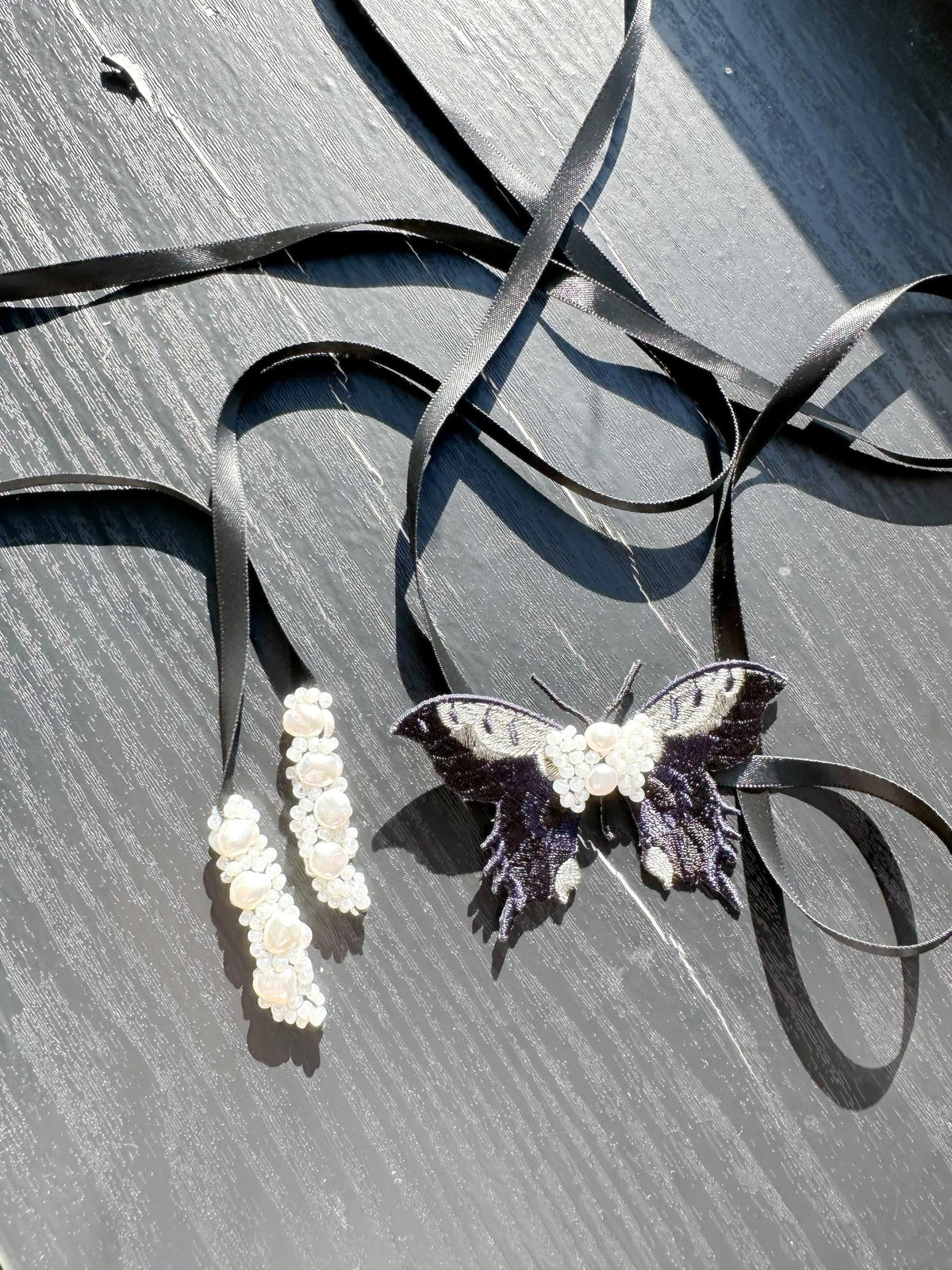 Handmade Choker featuring delicate hand-stitched embroidery of black color butterfly, adorned with freshwater pearls and glass seed beads