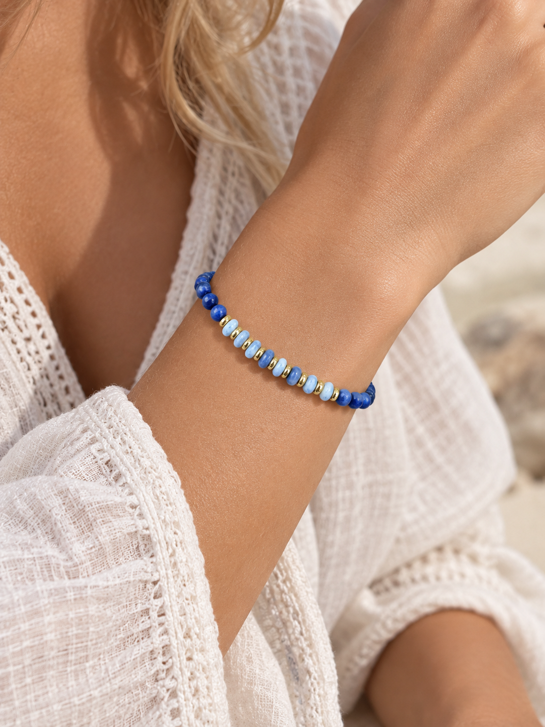 Handmade Bracelet for HIM OR HER. Made with 3mm lapis lazuli, 14K Gold Plated Spacer Beads, 2x3mm Blue and white Sodalite. Adjustable knotted Cord