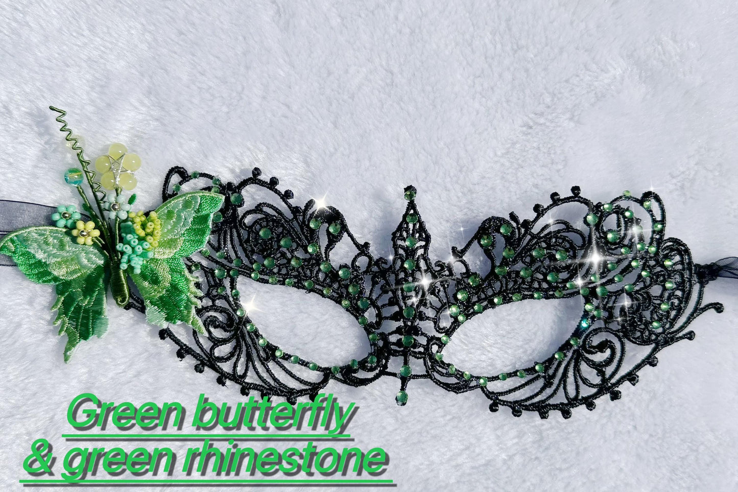 Handmade black lace masquerade mask with green color embroidered butterfly, green color rhinestones, and floral bead embellishments