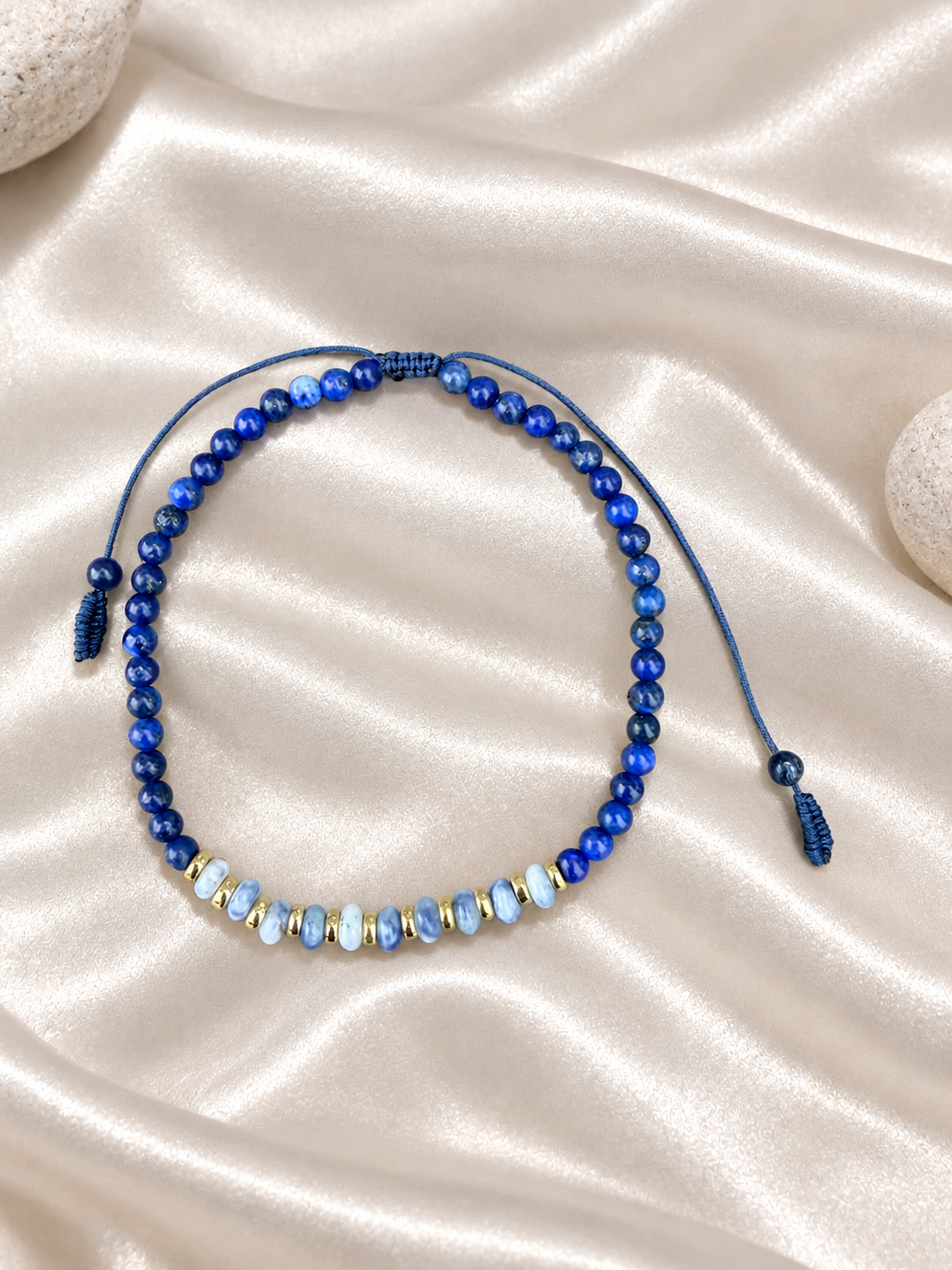 Handmade Bracelet for HIM OR HER. Made with 3mm lapis lazuli, 14K Gold Plated Spacer Beads, 2x3mm Blue and white Sodalite. Adjustable knotted Cord