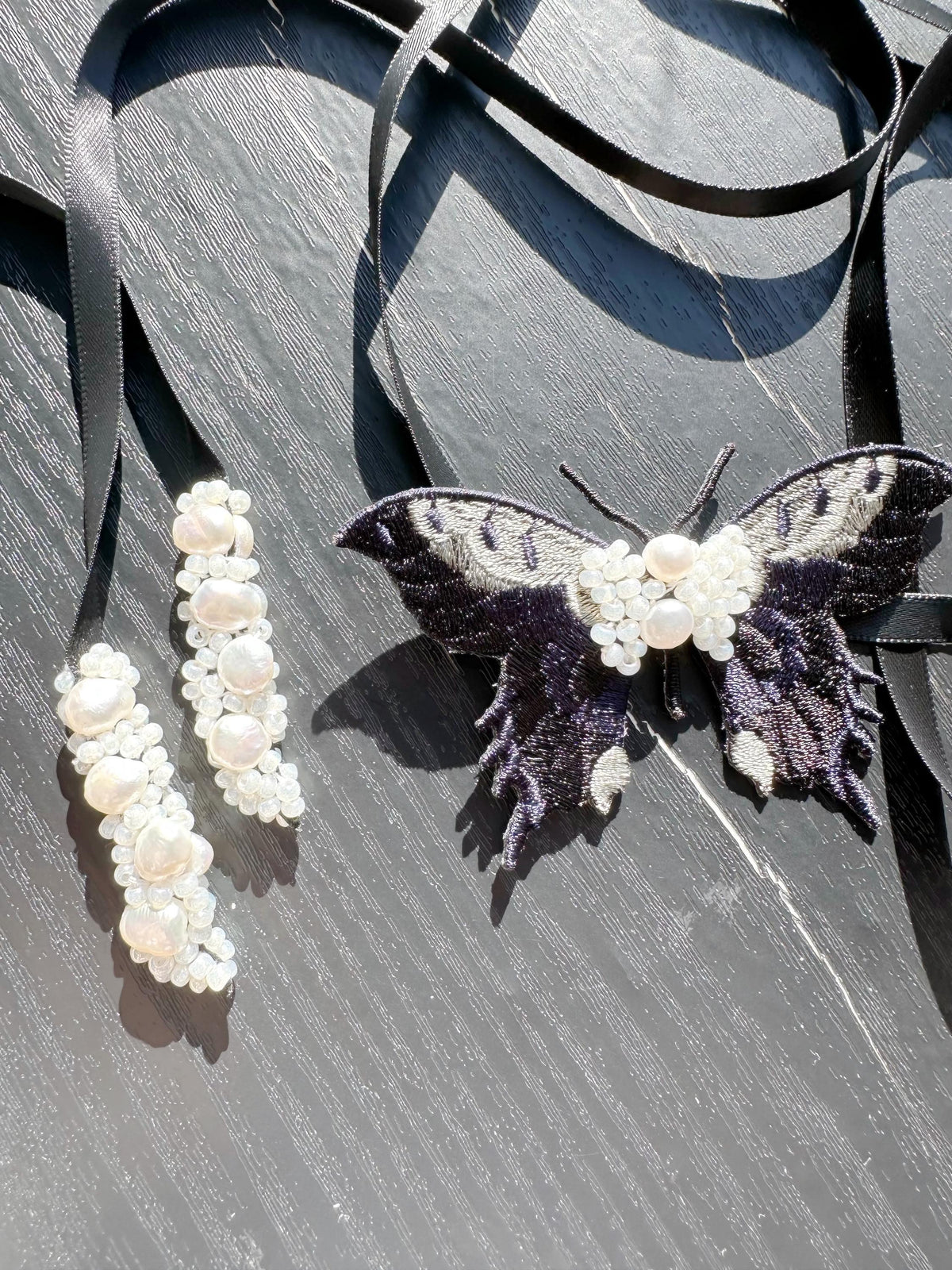 Handmade Choker featuring delicate hand-stitched embroidery of black color butterfly, adorned with freshwater pearls and glass seed beads