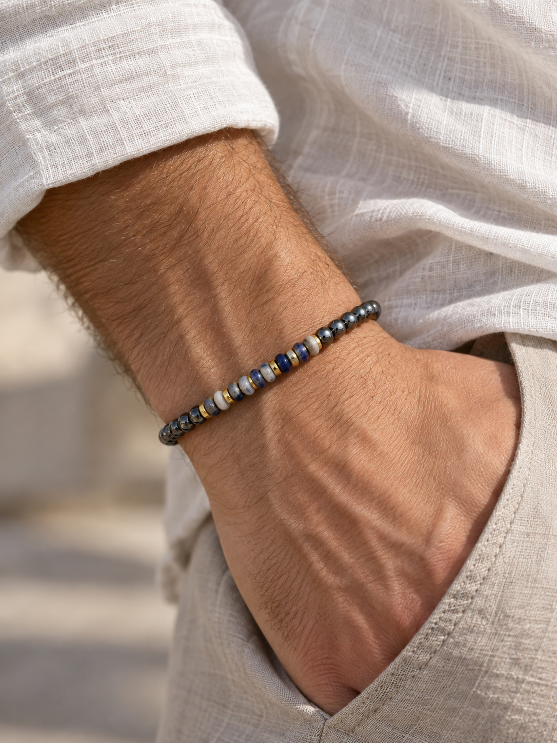 Handmade Bracelet for HIM OR HER. Made with 4mm Black Hematite, 2x4mm Blue White Sodalite, 14k gold plated spacer, Adjustable knotted Cord