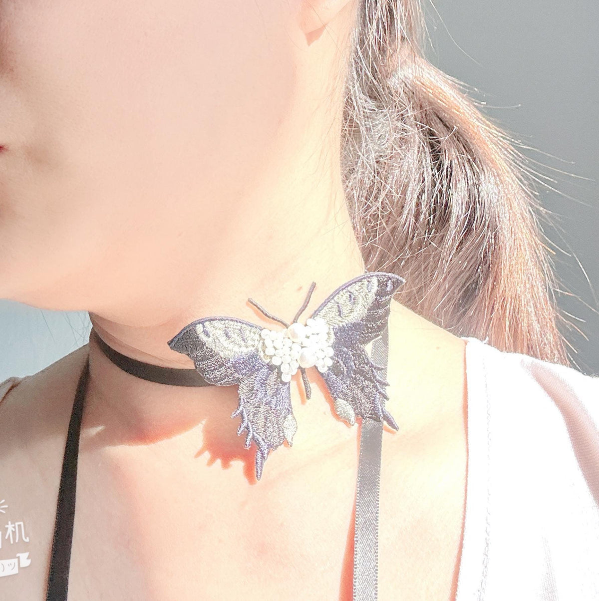 Handmade Choker featuring delicate hand-stitched embroidery of black color butterfly, adorned with freshwater pearls and glass seed beads