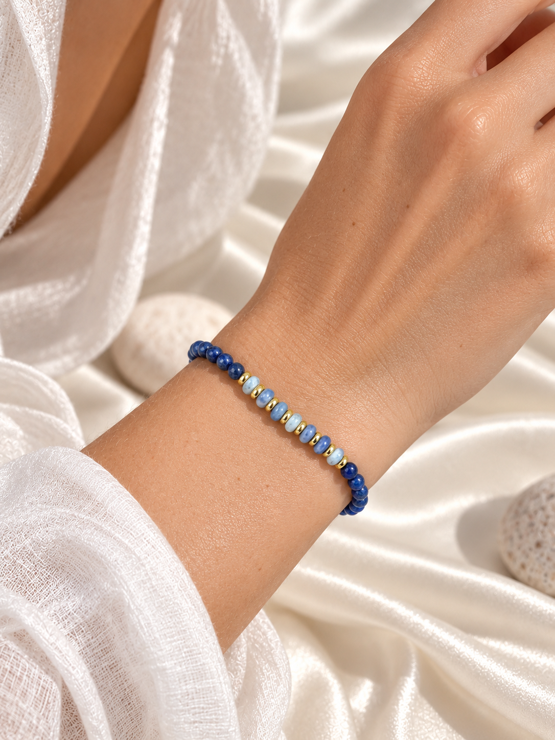 Handmade Bracelet for HIM OR HER. Made with 3mm lapis lazuli, 14K Gold Plated Spacer Beads, 2x3mm Blue and white Sodalite. Adjustable knotted Cord