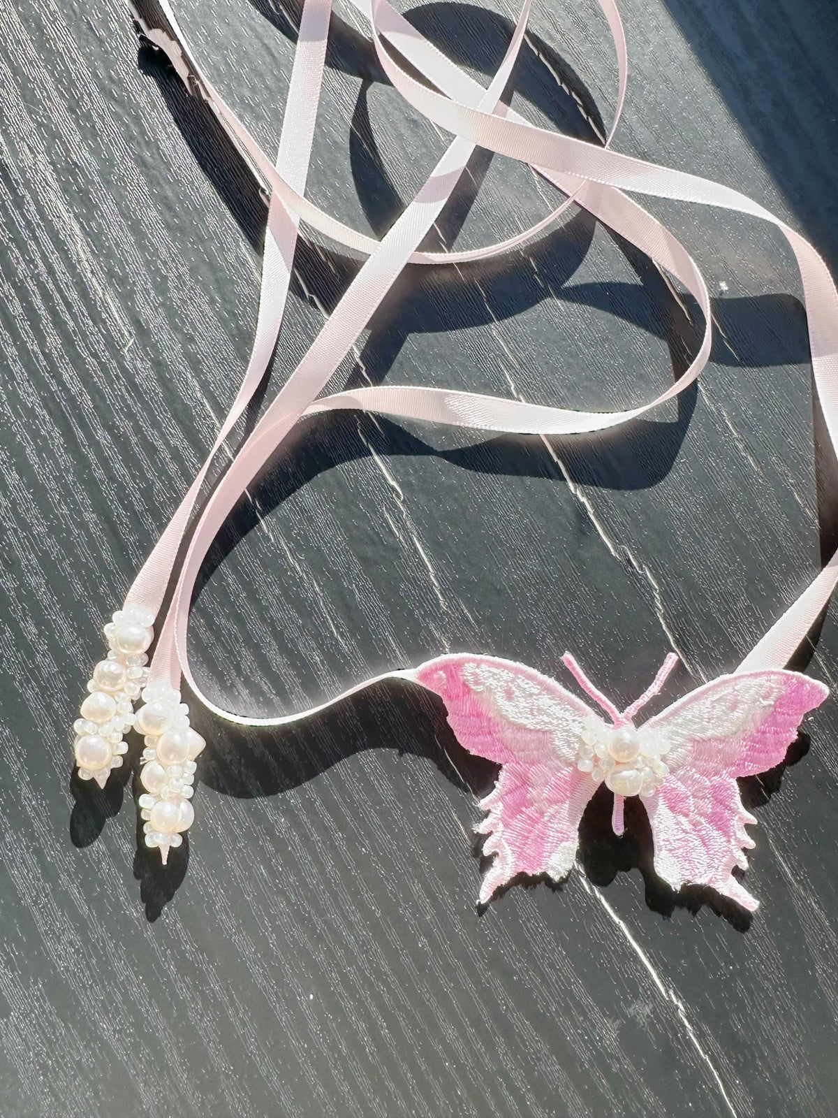 Handmade Choker featuring delicate hand-stitched embroidery of pink color butterfly, adorned with freshwater pearls and glass seed beads