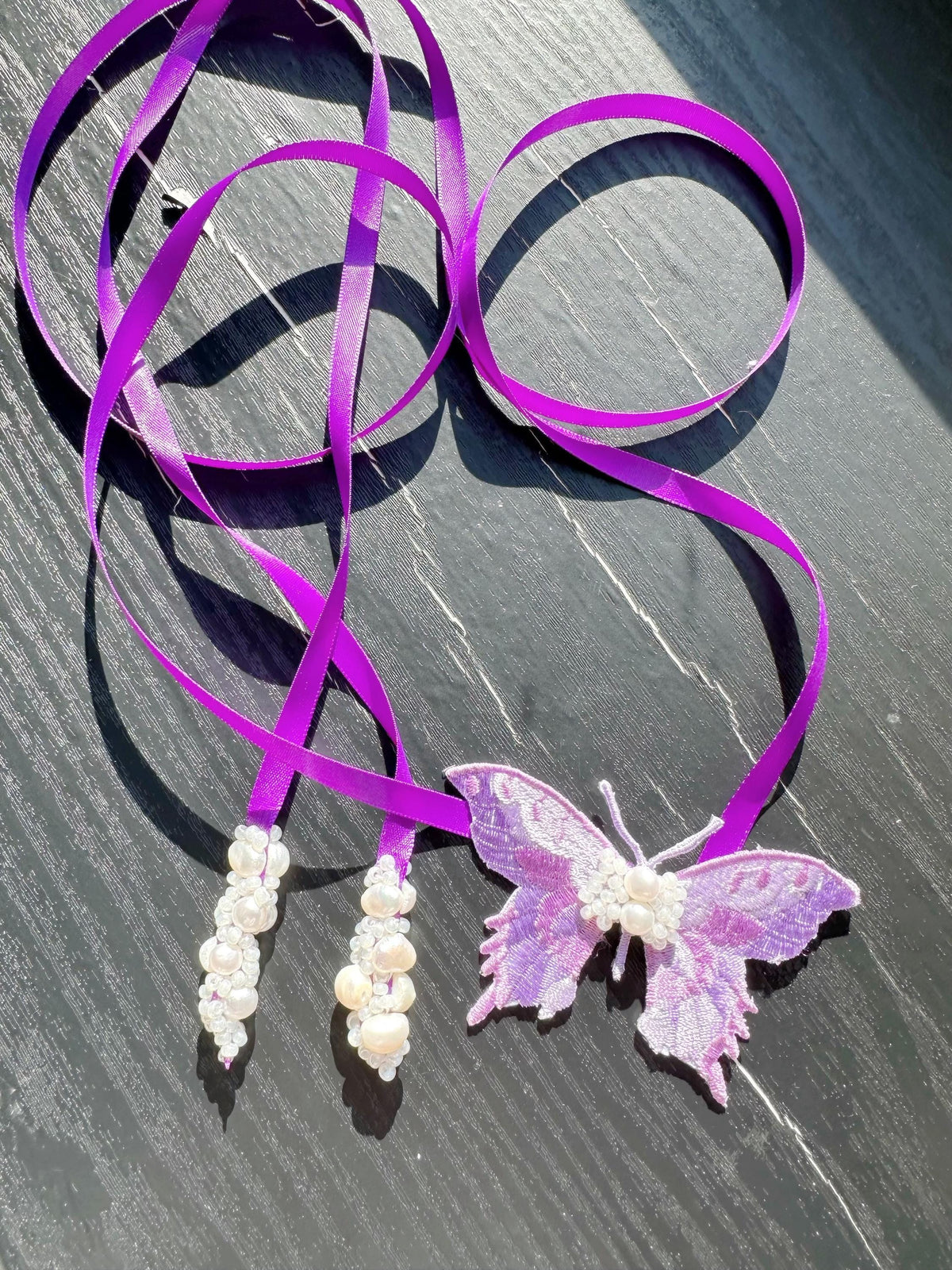 Handmade Choker featuring delicate hand-stitched embroidery of purple color butterfly, adorned with freshwater pearls and glass seed beads
