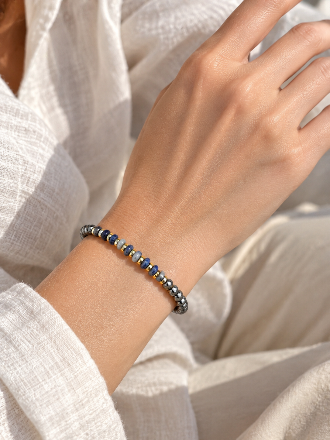 Handmade Bracelet for HIM OR HER. Made with 4mm Black Hematite, 2x4mm Blue White Sodalite, 14k gold plated spacer, Adjustable knotted Cord