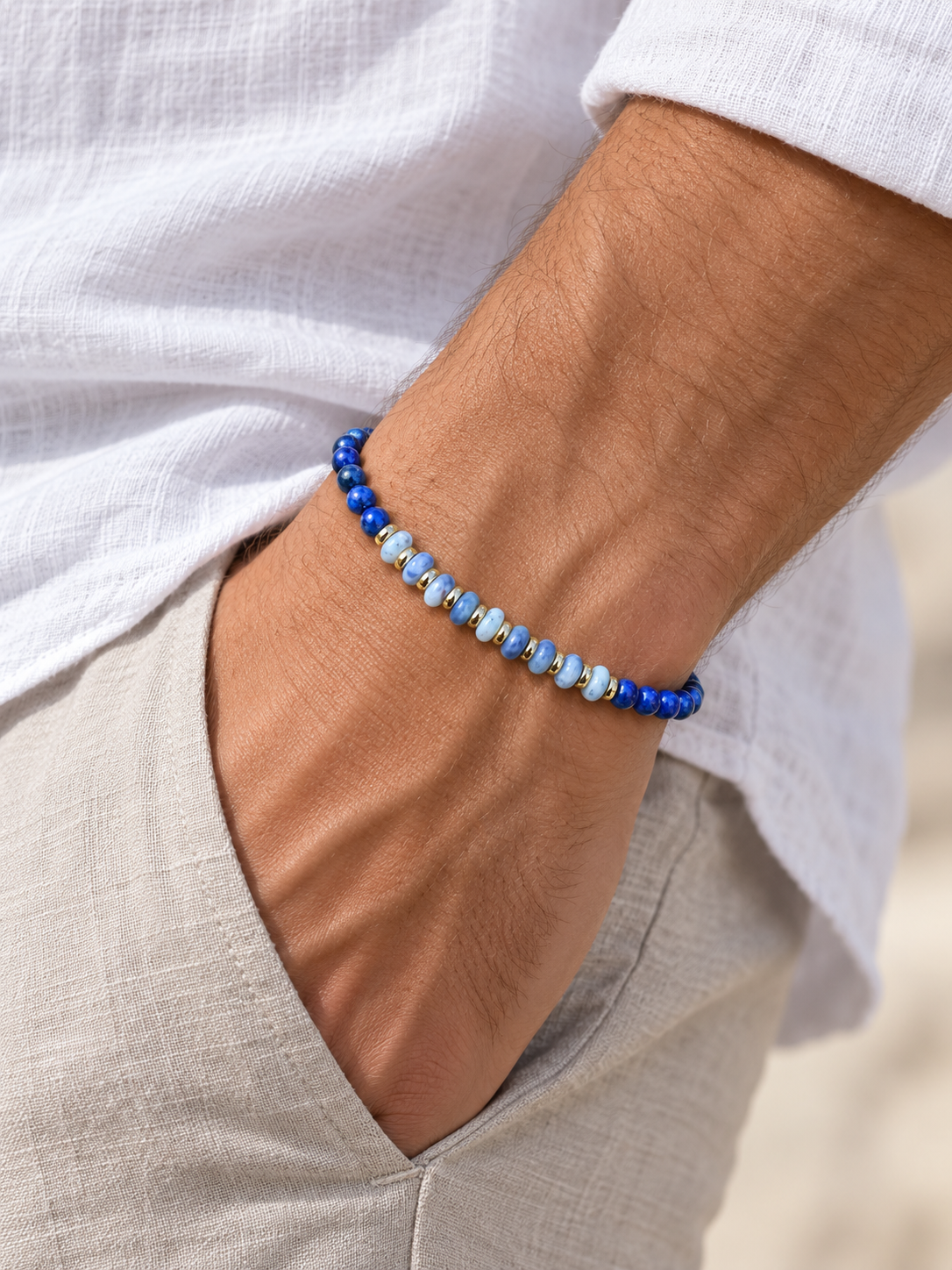 Handmade Bracelet for HIM OR HER. Made with 3mm lapis lazuli, 14K Gold Plated Spacer Beads, 2x3mm Blue and white Sodalite. Adjustable knotted Cord