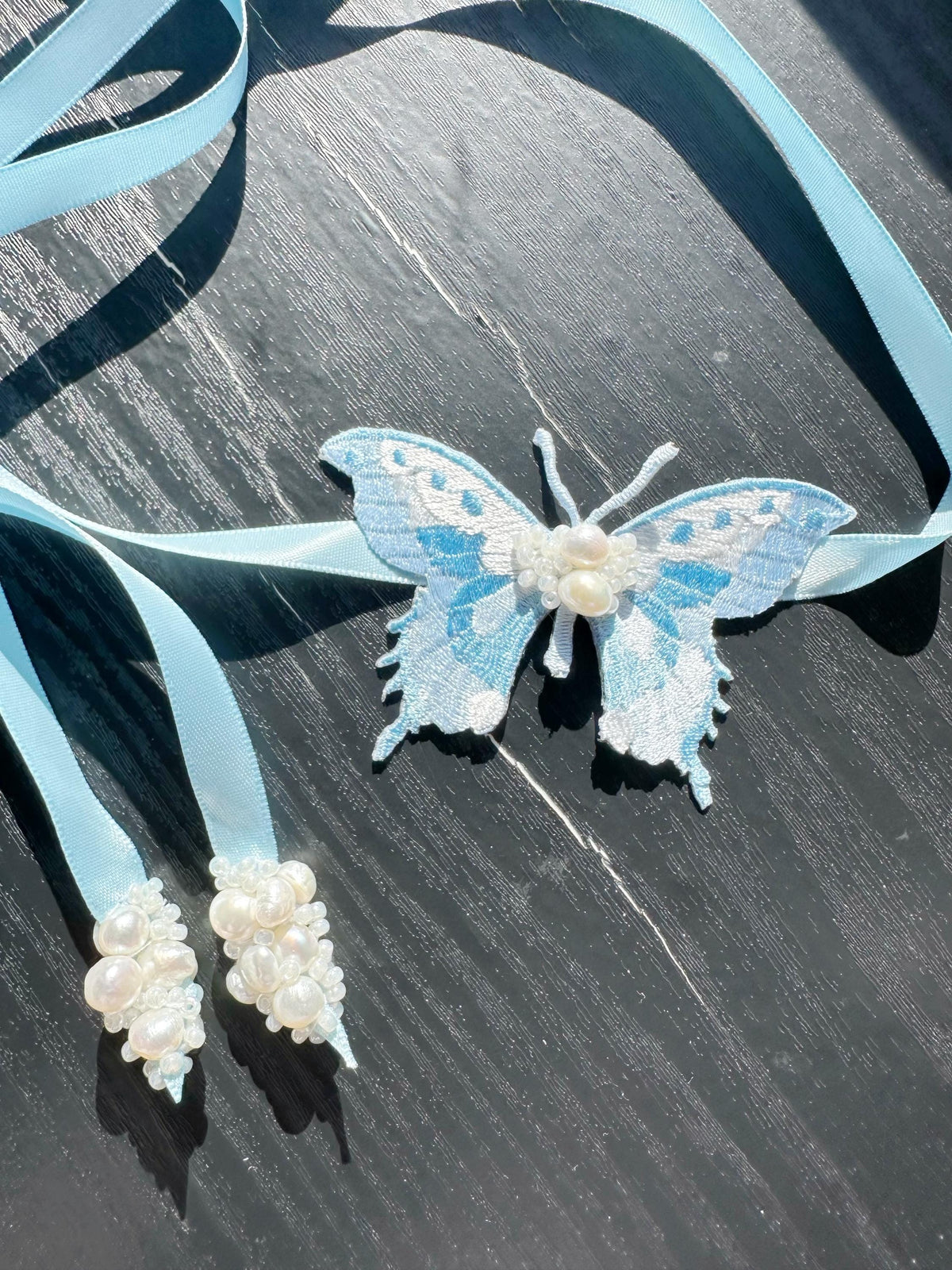 Handmade Choker featuring delicate hand-stitched embroidery of a blue butterfly, adorned with freshwater pearls and glass seed beads