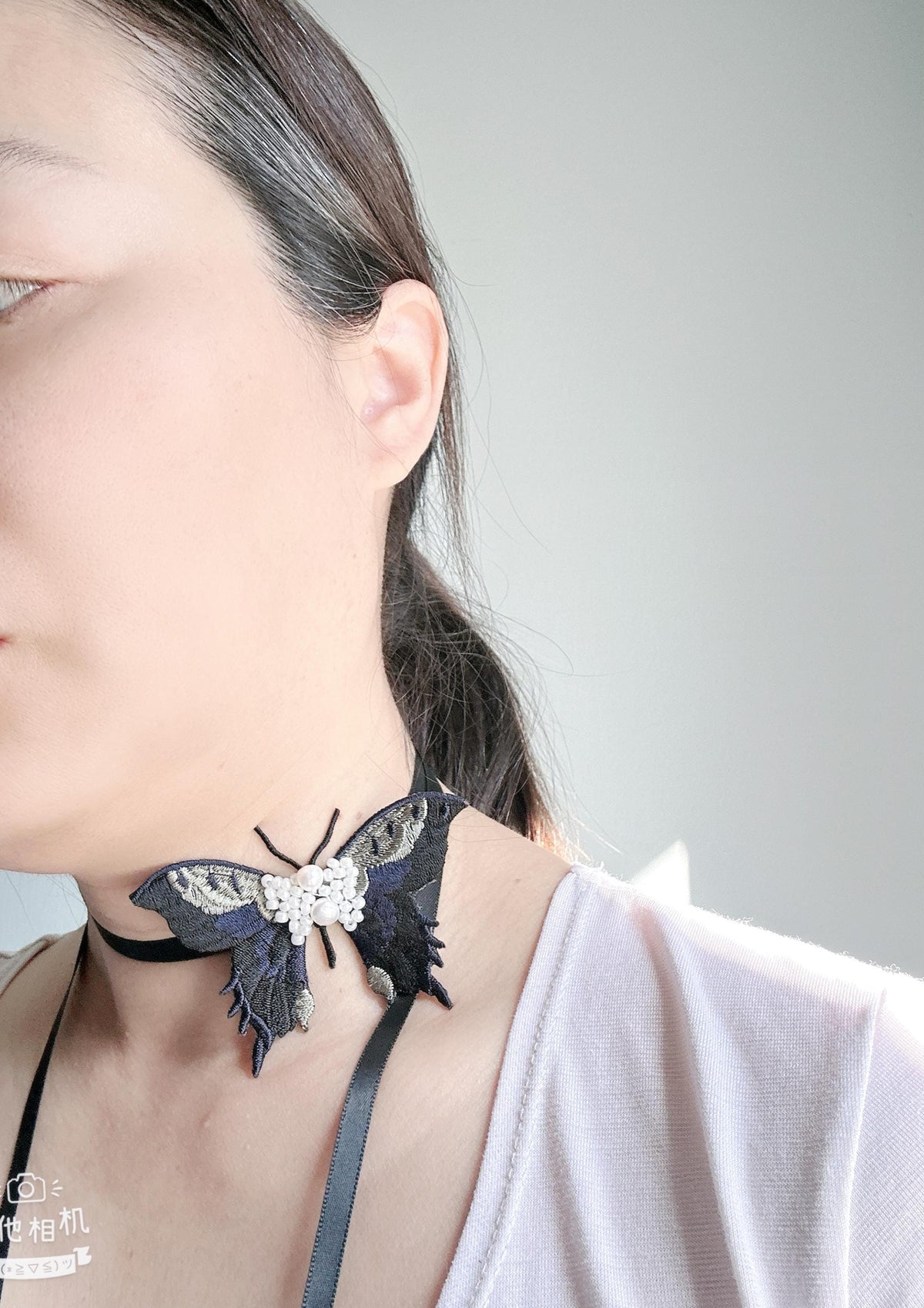 Handmade Choker featuring delicate hand-stitched embroidery of black color butterfly, adorned with freshwater pearls and glass seed beads
