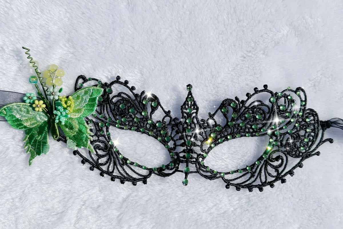 Handmade black lace masquerade mask with green color embroidered butterfly, green color rhinestones, and floral bead embellishments